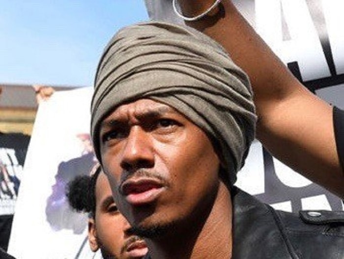 Nick Cannon in a grey turban